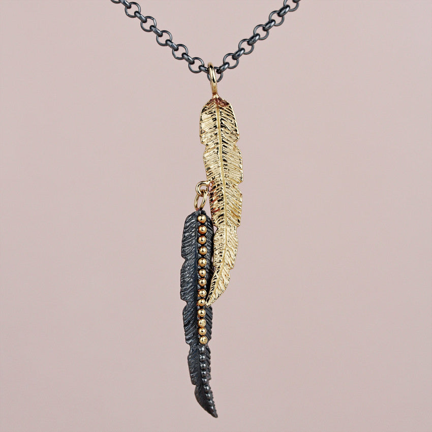 Double Sided Feathery Pendant